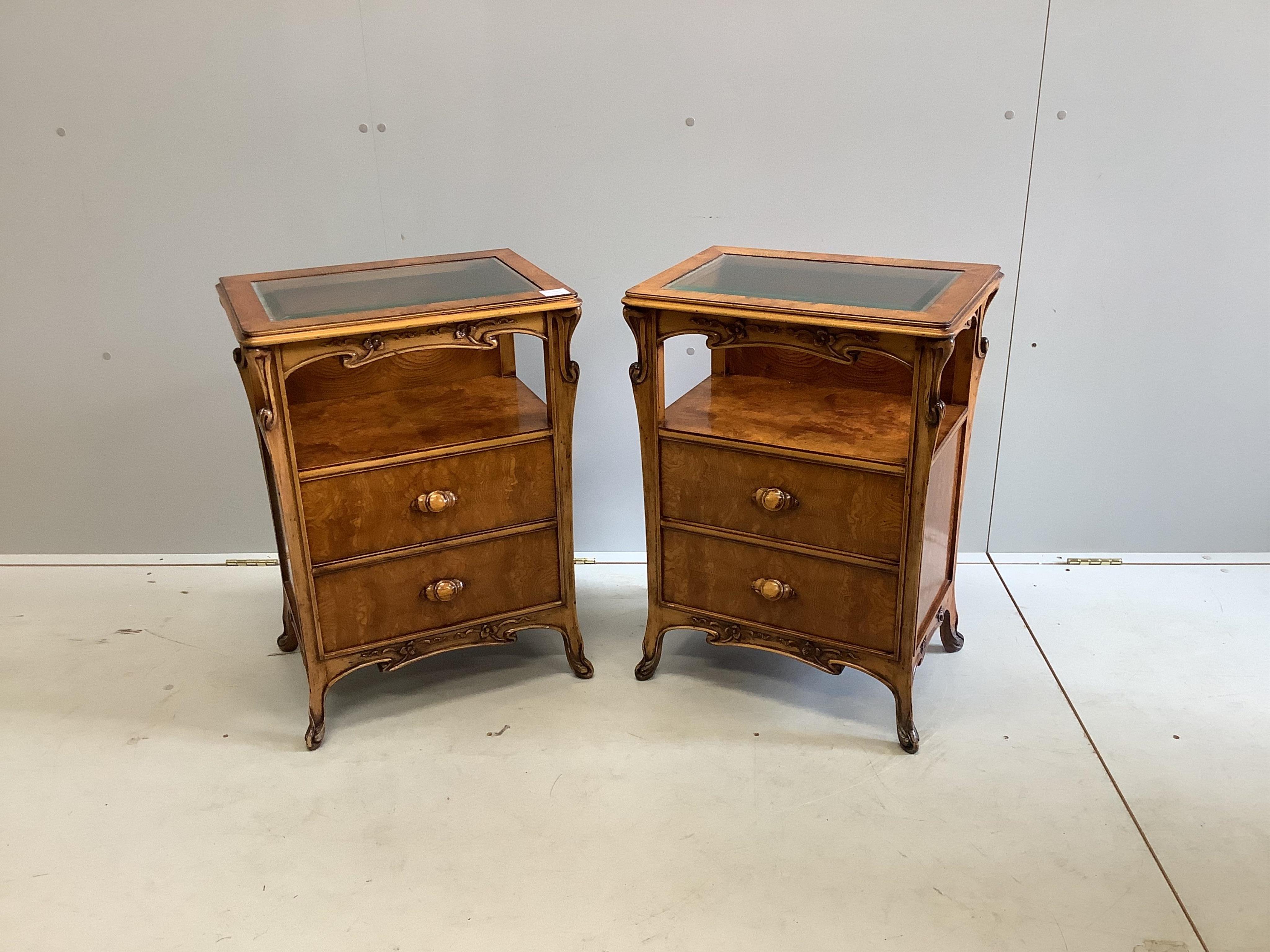 A pair of reproduction Gallé style burr elm bedside chests, width 51cm, depth 36cm, height 70cm, together with a matching caned headboard. Condition - good